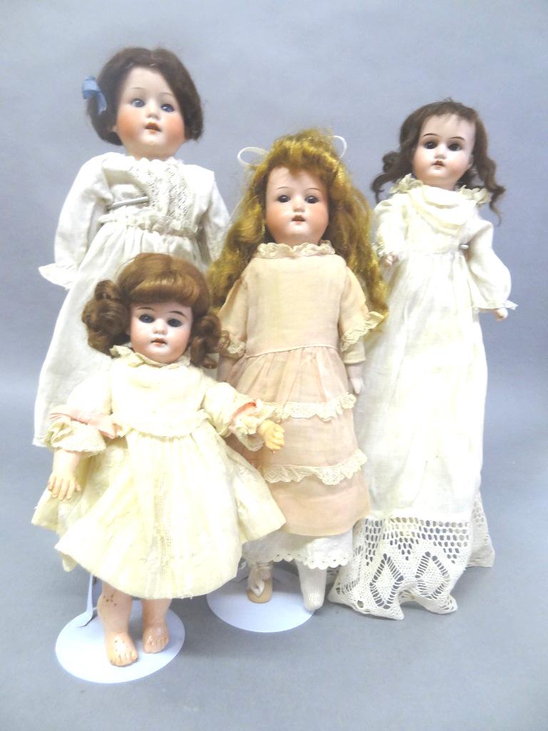 Four Bisque Dolls: Lilly 14", body cloth, Heubach 15" - body as is, DAK 10" composition body, all redressed, newer wigs, open mouths, Heubach #275, body good, Repair 14" body good