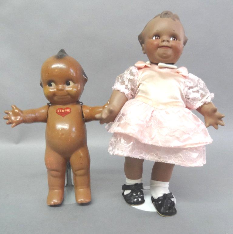 Contemporary Skootles and Vintage Kewpie: Contemporary Skootles by Jasco #425, bisque dress has stain, vintage black kewpie w/hears Black Rose O'Neill in excellent condition 10", slight age to arms w/red wig