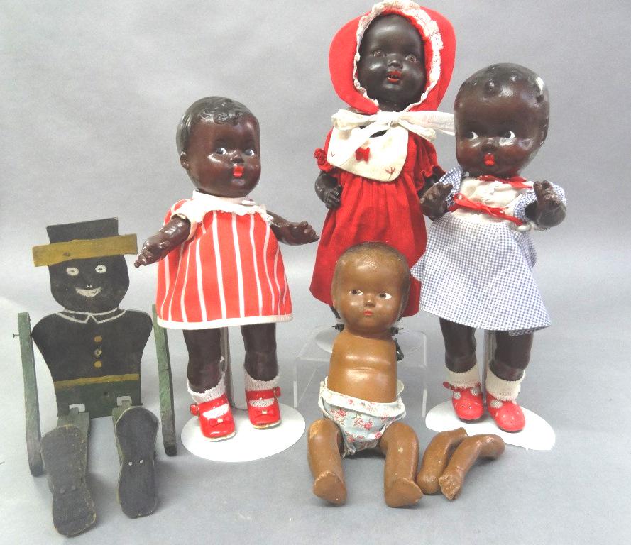 Four Black Doll Composition and Wooden Toy: One marked A&M, 2 others without markings, wooden jump toy 11", largest 11", very nice condition