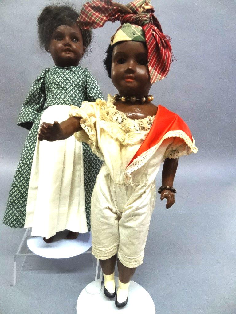 T.W. SFBJ Black Bisque Doll: T.W. SFBJ black bisque dolls, redressed, green has crazing on legs, missing teeth, wig is partial, body good, glass stationary eyes, redress with jump suit, glass stationary eye, body good, redressed 