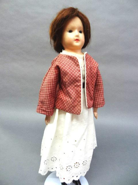 Unmarked Wax Doll: Beautiful face wax doll unmarked, 22", redressed, body stuffed, wooden arms & legs, they are painted w/shoes, wax head w/glass eyes, old wig, redressed