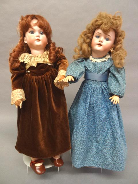 Two Bisque Dolls: Handwerk 22" #109 earrings, new wig, composition body, open/close eyes, open mouth, C.M. Bergman made in Germany 22", head repair on back, composition body, both open mouth, beautiful face