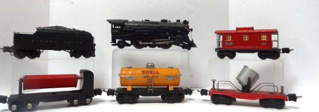 Trains Lionel Freight Set six pieces: Engine 275E, Whistle, 262, 2235 U, 2657 Caboose, 2620 Search Car, Shell 2654, 3659 Dump