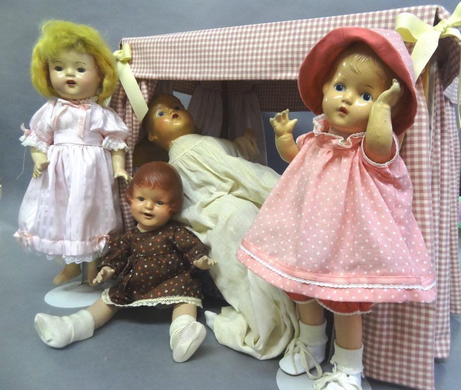 Anne Poster Bed and Four Composition Dolls: Contemporary poster bed 21" (L) x 18" (H) x 14", with bed dressing in poor condition, canopy top together w/4 composition dolls, Alex Princess Elizabeth 18", redressed, old wig not original, good face