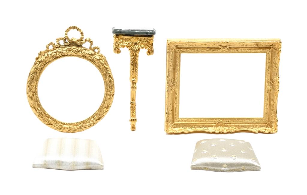 John Hodgson Dollhouse Accessories: John Hodgson single leg pier table, gold gilt over solid brass 3"H, picture frame 2.75" by 3.25", round frame 3"H, two Hodgson signed chair seats with scalloped front edges