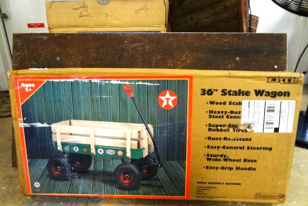 Ertl Texaco Stake Wagon in Original Box: Ertl 36" stake wagon, wooden stakes, rubber tires, wide wheelbase, easy steering, original box shows wear, box size 13" x 19" x 8"