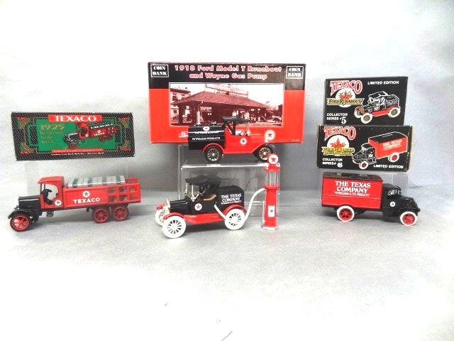Texaco Trucks, Car and Filling Station Banks in O/B: Three Ertl die cast vehicles & Gearbox, 1925 Kenworth stake truck series 9, 1925 Mack Bulldog lubricant truck series 6, 1918 Ford Runabout series 5, and Gearbox 1918 Ford Model T Runabout + Wayne gas