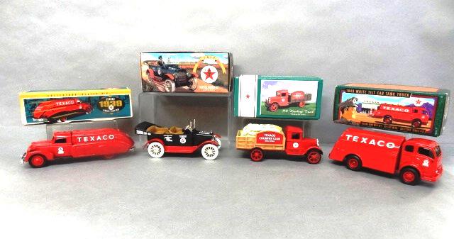 Texaco Truck Banks in O/B: Texaco Ertl die cast banks, 1917 Maxwell Touring Car series 4, 1931 Hawkeye truck series 3, 1949 white tilt cab series 13, 1939 Dodge Air Flow series 10 8" x 4" x 4"