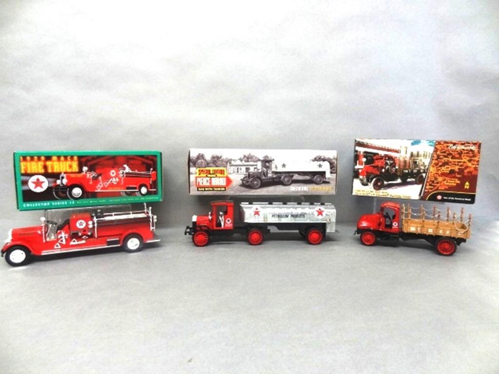 Texaco Truck Banks in O/B: Texaco Ertl die cast 1929 Mack fire truck series 15, 1918 Mack AC Bulldog flat bed, 1920 Pierce Arrow cab & tanker, 12" x 4" x 3"