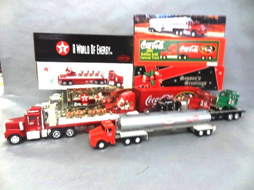 Texaco and Coca-Cola Tractor Trailers in O/B: Texaco tanker & cab, 1919 Seasons Greetings tractor trailer series 5, flatbed tractor trailer 2000, tractor trailer holiday series, Coca-Cola tractor trailer holiday gold