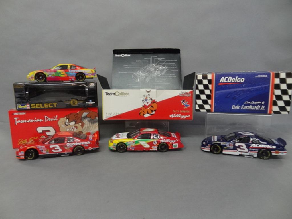 NASCAR Die Cast Cars in O/B: Team Caliber 2000 Kelloggs Monte Carlo #5 Terry Labonte, 2001 Goodwrench #3 Dale Earnhardt, 1999 Monte Carlo #3 Dale Earnhardt Jr., Revell 1999 Goodwrench Monte Carlo #3 Dale Earnhardt 13" x 6" x 5"