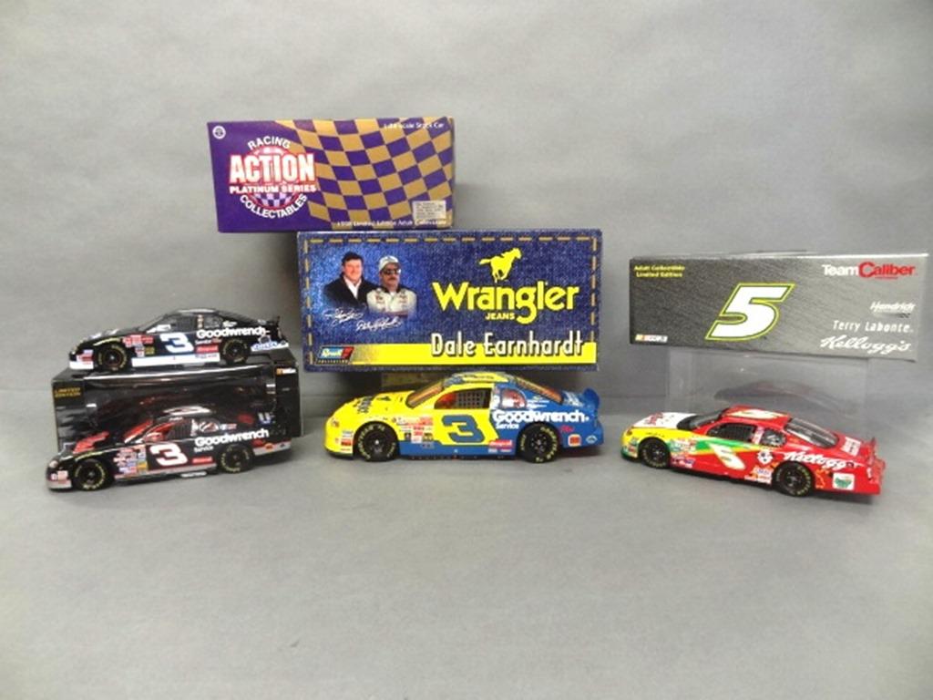 NASCAR Die Cast Cars in O/B: Team Caliber 2000 Kelloggs Monte Carlo #5 Terry Labonte, 2001 Goodwrench #3 Dale Earnhardt, 1999 Monte Carlo #3 Dale Earnhardt Jr., Revell 1999 Goodwrench Monte Carlo #3 Dale Earnhardt 13" x 6" x 5"
