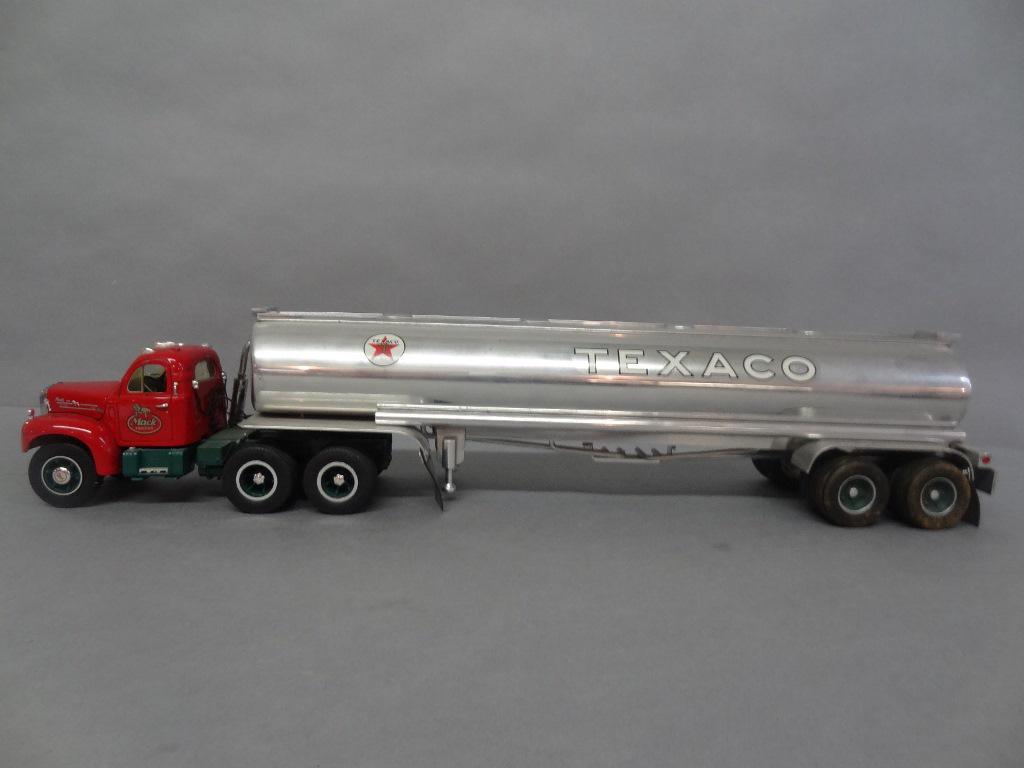 Die Cast Mack Tractor Trailer Tanker: First Gear die cast Texaco tanker B-61 model missing mirror, mud flap broke off 25" x 5" x 4 1/2"