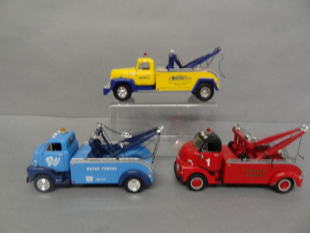 Die Cast Wreckers: First Gear 1952 GMC wrecker "Wayne Towing", 1952 GMC wrecker "Chicago Fire Dept", 1957 International wrecker "J.C. Whitney", missing mirrors, tangled lines 8" x 3" x 3 1/2"