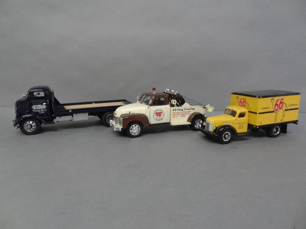 Die Cast Tow Truck and Box Trucks: Danbury Mint 1938 GMC car carrier, ADA 1953 Chevy wrecker "Thunder Towing", First Gear 1949 International box truck "Campbell 66 Express" 11" x 4" x 4 1/2"