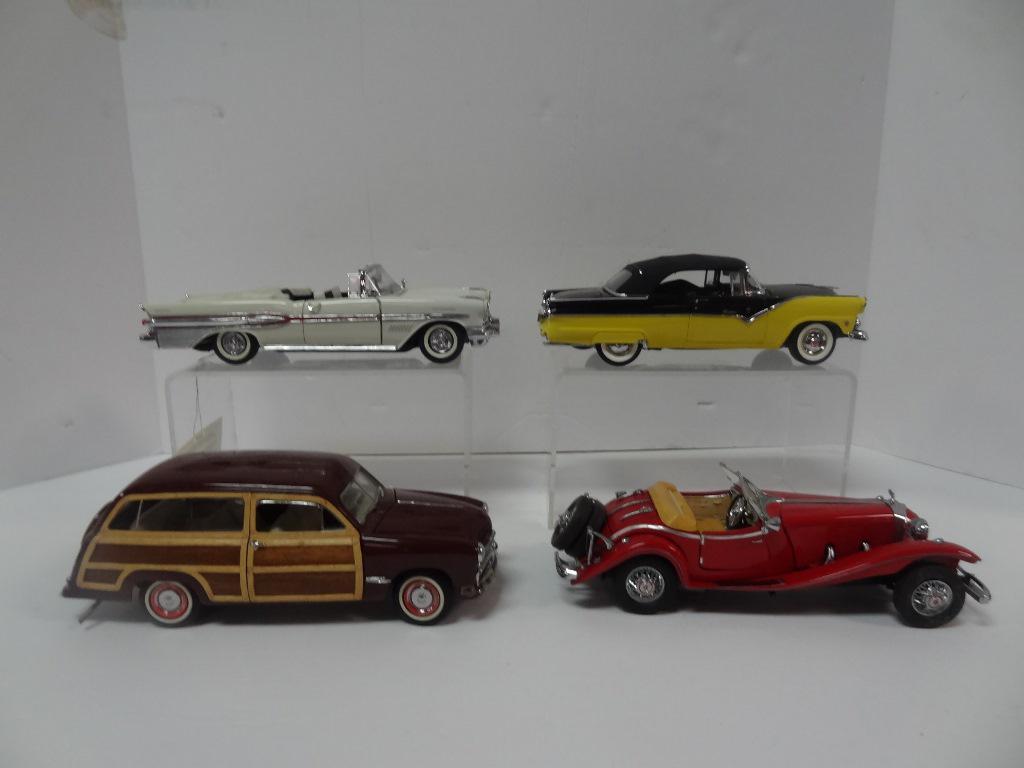 Die Cast Vintage Cars: Three Franklin Mints 1949 Ford Woody Wagon, 1925 Mercedes-Benz 500K Roadster Special, 1957 Pontiac Bonneville, and Danbury Mint 1955 Ford Fairlane, 8" x 2 1/2" x 2"