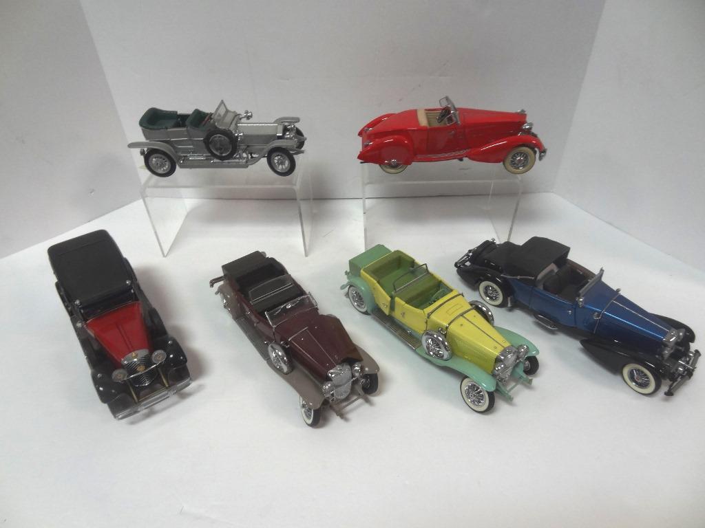 Die Cast Vintage Cars: Five Franklin Mints, 1907 Rolls Royce Silver Ghost, 1933 Duesenberg, 1930 Duesenberg Derham Tourster, 1935 Mercedes-Benz 770K, 1920 Duesenberg Derham Tourster, and Danbury Mint 1934 Packard V-12 Speed