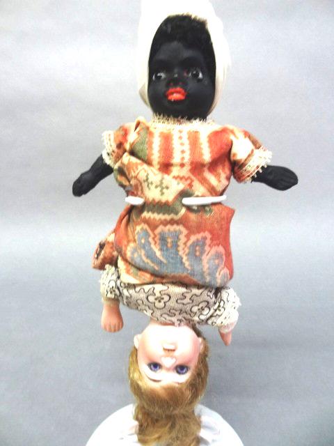 Topsy Turvey Bisque Doll: Topsy Turvey 9 1/2" doll, top A&M 3200, glass eyes, shoulder head, open mouth, cloth body, black painted bisque doll, glass eyes, bisque arms, cloth body, both colorful outfits, could be hand made