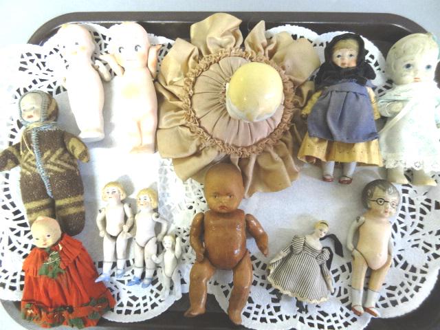 Antique Miniature Dolls, Bisque: Kewpie Rose O'Neill 5", Black baby 5" Germany, all bisque 6", all bisque Eskimo doll with glasses, 4" 3 bisque dolls & other, all show age