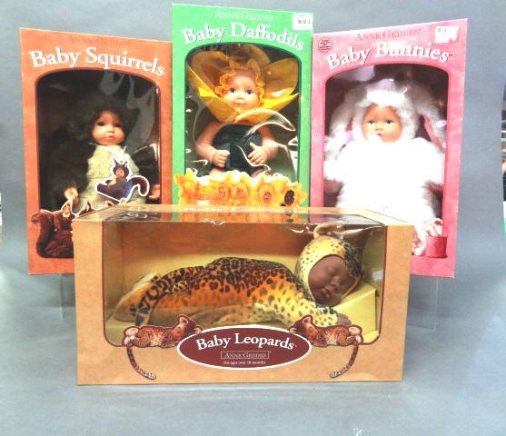 Four Anne Geddes Dolls in O/B: Baby Daffodils, Baby Leopards, Baby Bunnies, Baby Squirrels, all 17" x 8"