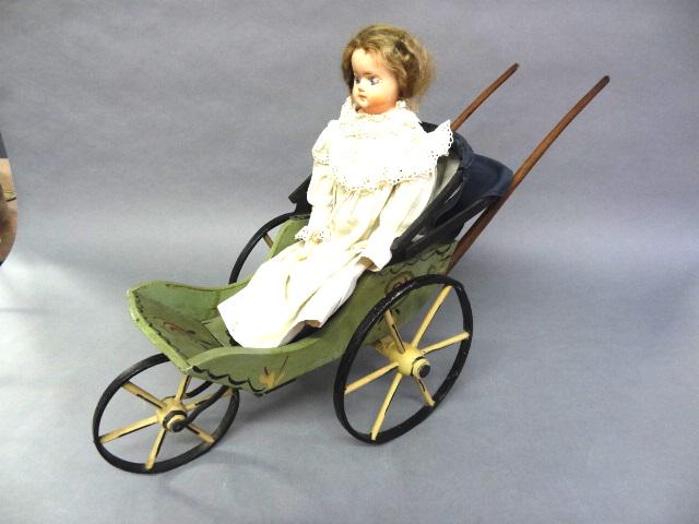 Compo Doll in Painted Carriage: Compo Doll &Compo Legs of works, Painted Carriage as is 29" x 10" 20" Doll No Back Hide