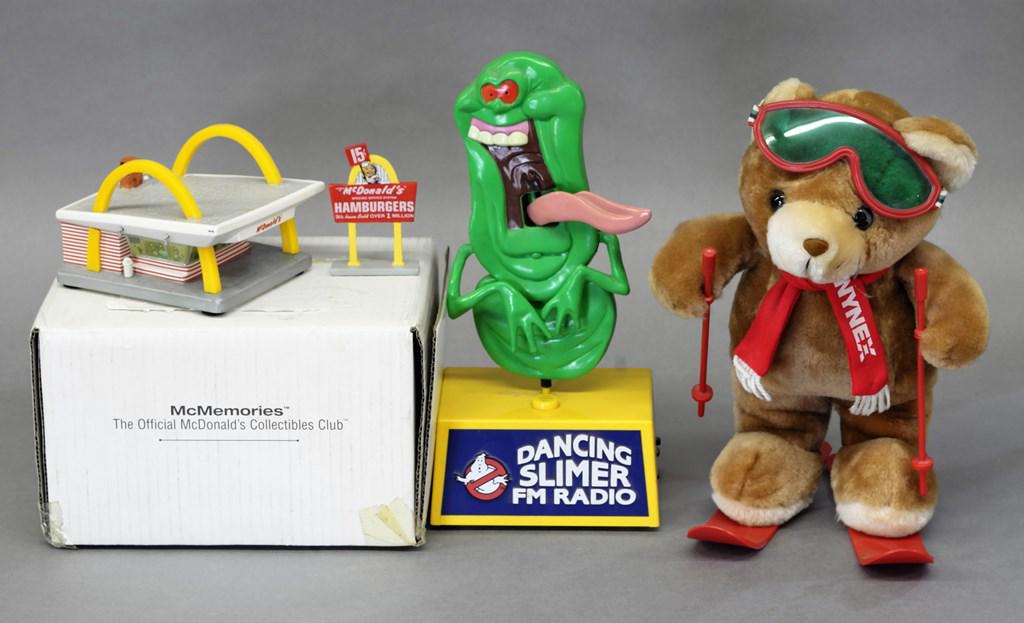 Ghostbusters Slimer Radio, McDonald Light & Bear: Justin Products 1989 battery operated Dancing Slimer FM radio 12.5"H, "McDonald's Classic" porcelain lighted restaurant 6"L with sign in original box, NYNEX bear on skis 12"H