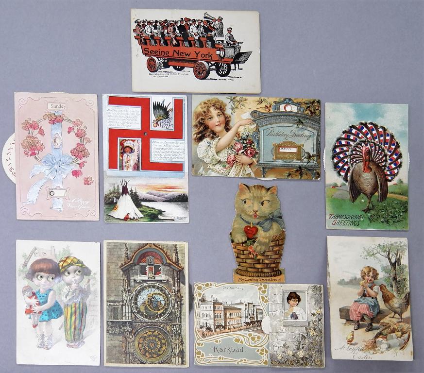 10 Antique Mechanical Postcards: Nice group of 10 mechanical antique postcards includes Karlsbad naked lady in the bathtub, Easter squeak card, clock card with rotating saints, Native American card with rotating swastika, Thanksgivin
