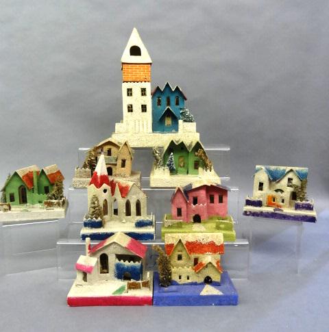 Vintage Sparkling Christmas Houses and Church: Tallest 12" by 8" long 5" wide with some damage. 8 small house made in Japan. Church has damage, steeple not connected. All houses are as is.