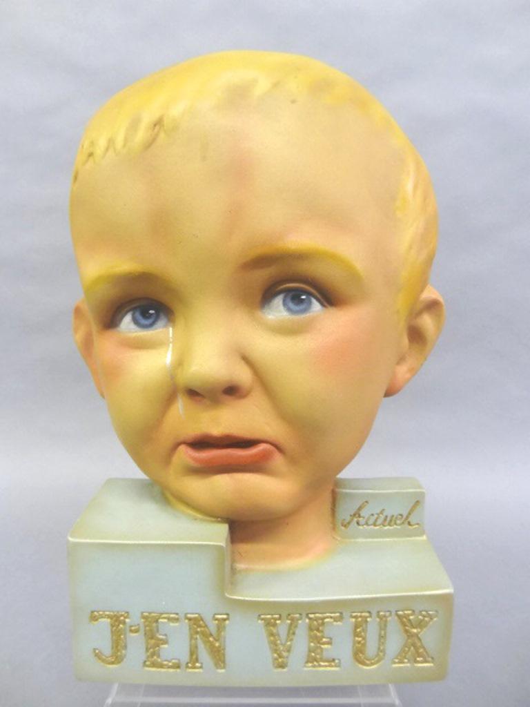 Vintage French Crying Child Store Display: Vintage mid-century French painted store counter advertising plaster display, inscribed ["Actuel J'EN VEUX" - I want it now], 13.75"H, 8.25"W, 3"D