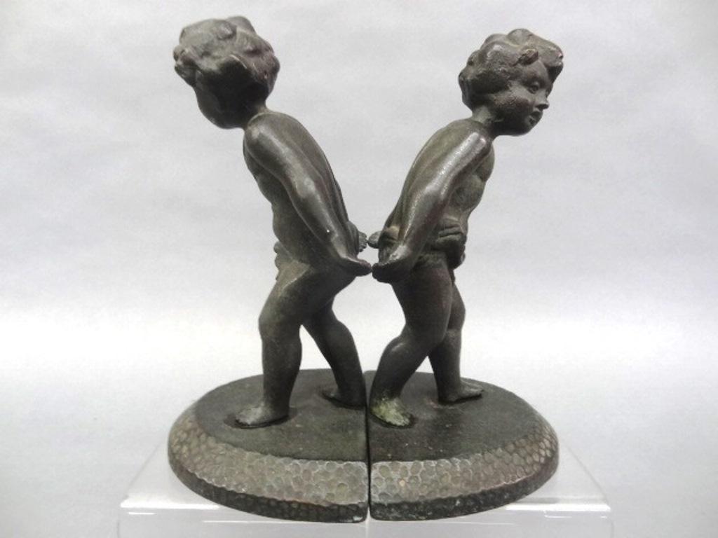 Cast Iron Cherub Bookends: Pair of antique cast iron cherub or Putti bookends 7.5"H