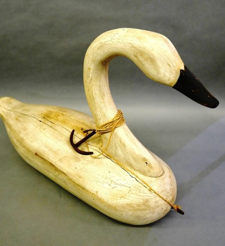 Ken Shelly Carved Swan Decoy: Hand carved painted wood swan decoy with small cast iron anchor attached by chain and rope, incised name "PARKER" on both sides, incised signature on bottom "Ken Shelly", 32"L, 21"H, 10"D