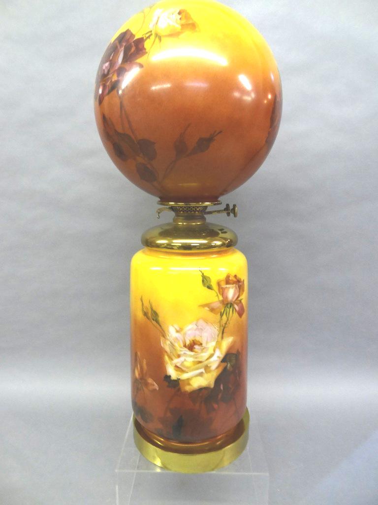 Hand Painted Rose Parlor Lamp: Vintage hand painted parlor lamp with an electrified Phoenix burner, glass globe and base with roses signed illegibly by the artist [A.M. Parloin or Parloim?], 31"H overall