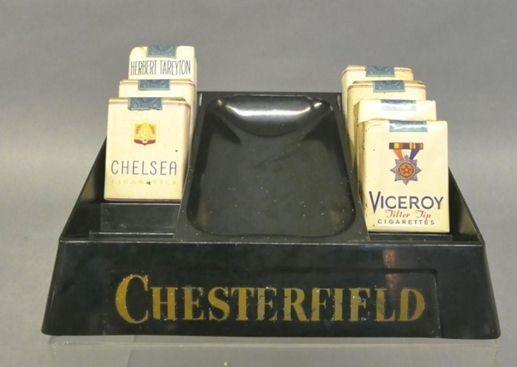Vintage Chesterfield Cigarette Store Display: Vintage Chesterfield plastic store display with two cigarette racks flanking an ashtray 8.75" by 10.5", includes seven packs of vintage cigarettes for display purposes only, buyer must be 21 years of 