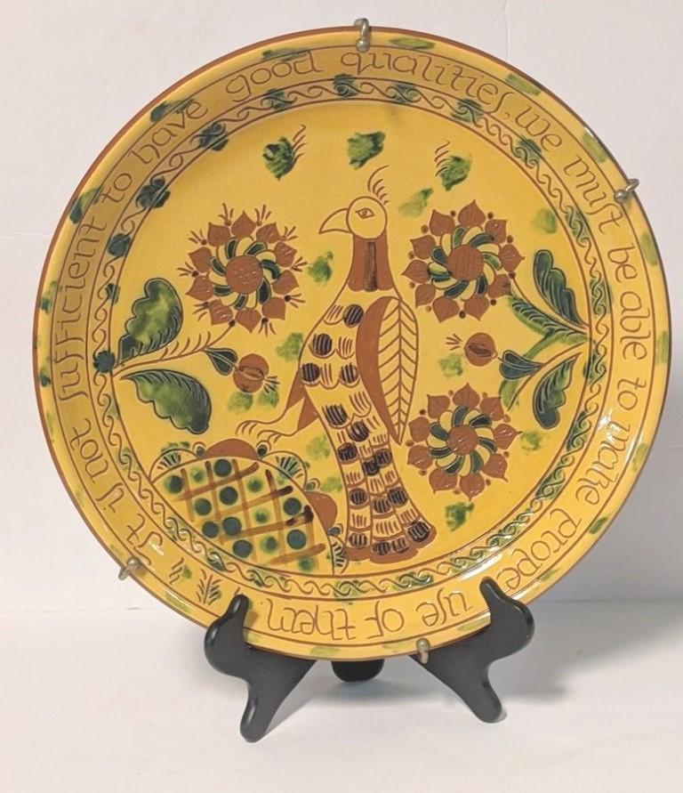 Lester Breininger Bird Charger: Lester Breininger redware deep 16.25"D charger with central parrot, slip and sgraffito decoration, signed and dated on reverse 1995 and #2, includes welded steel rod wall hanger