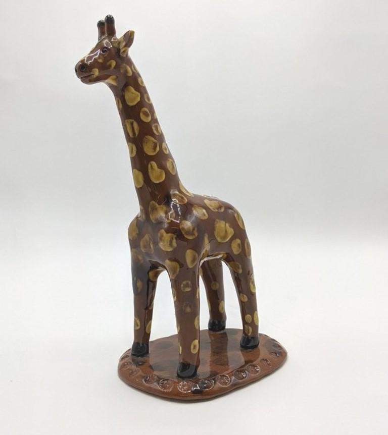 Breininger Redware Giraffe Figural Statue: Lester Breininger redware giraffe with slip decoration, punch decoration around edge of base, signed and dated 2005, 10"H