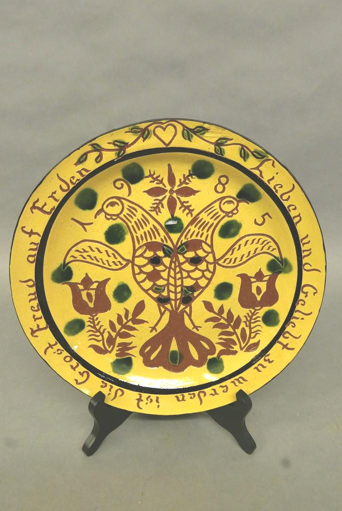 Dorothy Long Redware Charger: Dorothy Long, Chester County Pa. artist, redware love charger featuring a double headed eagle with tulips, slip and sgraffito decoration, 12"D