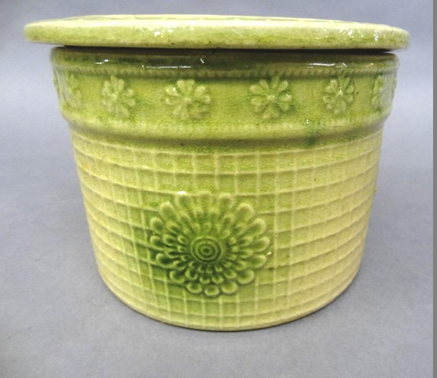 Green & White Stoneware Crock: Vintage green and white glazed crock with lid has a grid work and floral decoration 7.5"D, 5.25"H
