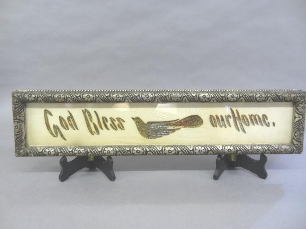 Antique Folk Art Plaque: Antique "God Bless Our Home" plaque in an original ornate frame, crushed mica on paper applied wording and dove, delicate knife cut raised leaves, 5.5" by 23.5"L