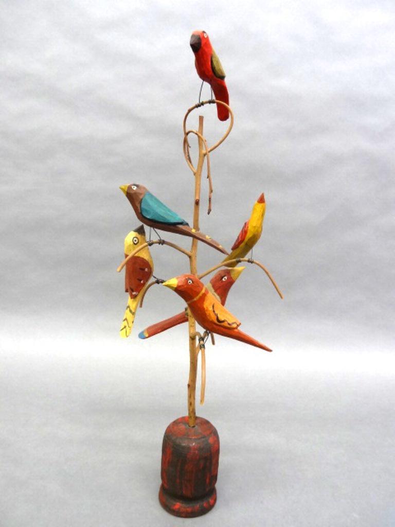 Daniel & Donna Strauser Folk Art Bird Tree: Daniel and Donna Strauser artisan Pa. hand carved and painted bird tree with six birds perched on the branches, mounted on turned wood base, 21"H, signed and dated 02 on bottom