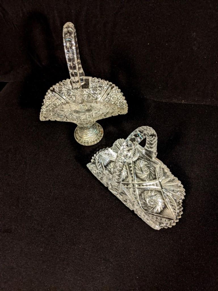 Two Antique Cut Glass Baskets: Antique cut glass basket with raised foot, 13"H, 9.25"W, 4.5"D, low basket 8.5"H, 10.5"W, 5.5"D