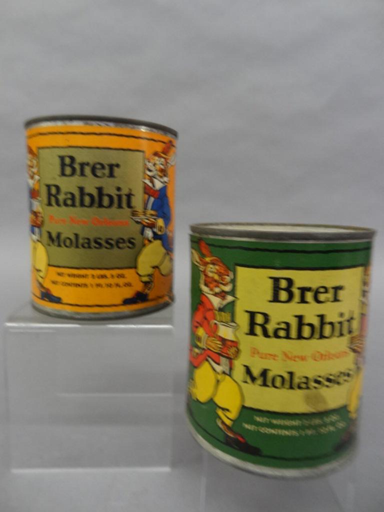 Two Vintage Brer Rabbit Molasses Tins: Two vintage Brer Rabbit Molasses Tin Cans by Penick & Ford, New Orleans Louisiana, with colorful paper labels, 2lbs 5oz. Size, 4.5"H