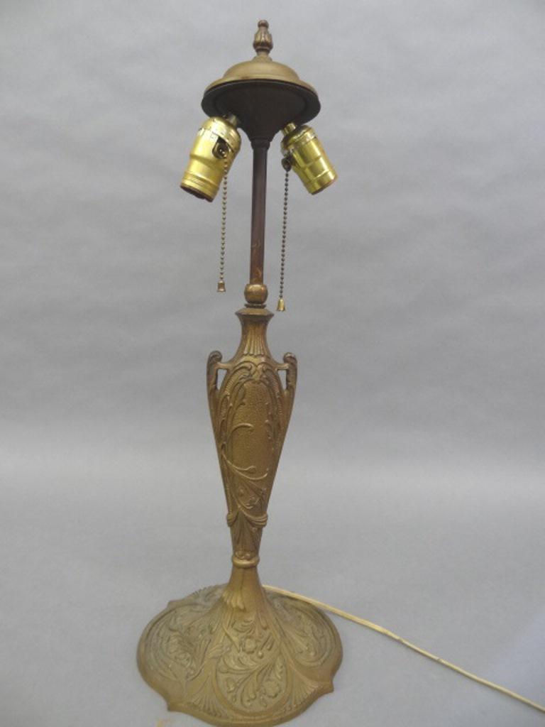 Antique Art Deco Lamp Base: Antique painted iron lamp base, urn form with deep relief flowers and scrollwork, scalloped base with cast mold number 1737, 23"H to top of finial