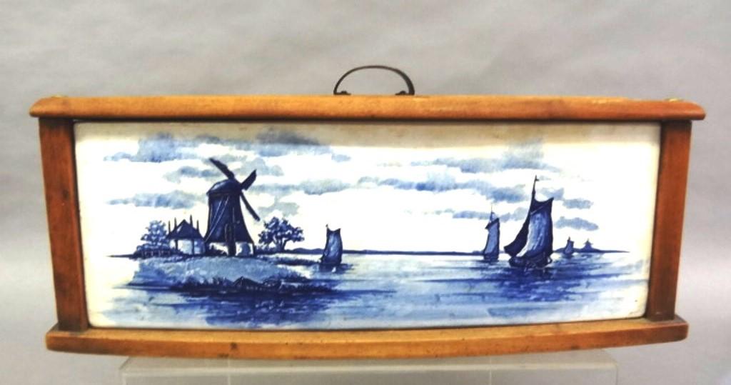 Vintage Delft China & Wood Box: One piece china box with delft blue and white decoration mounted inside wood framework with hinged lid, bottom with incised bee or shield mark and incised number 6682/2., 15"W, 9"D, 5.5"H