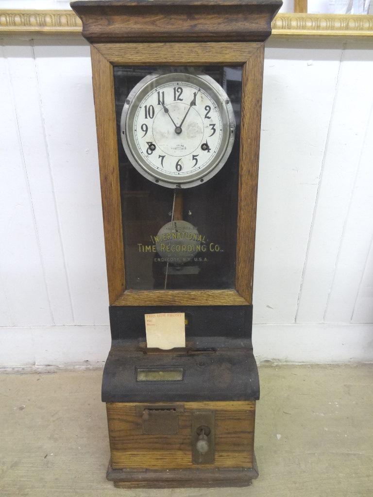International Time Recorder Time clock: Antique wall hanging oak cased workman's time clock, made by International Time Recording Co., 39"H, 14.5"W, 11"D