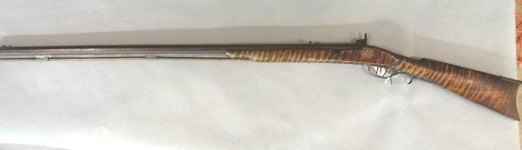 Early Pa. Percussion Rifle: Early Pennsylvania percussion rifle, heavy small bore octagon barrel, with dovetailed sights, lock engraved with hunter and scrolls, double set triggers, brass trigger guard and butt plate, nicely fig