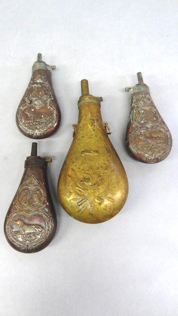 Four Vintage Powder horns: Large brass powder horn 9"H, three matching lead powder horns 6.25"H, all appear to be older reproductions