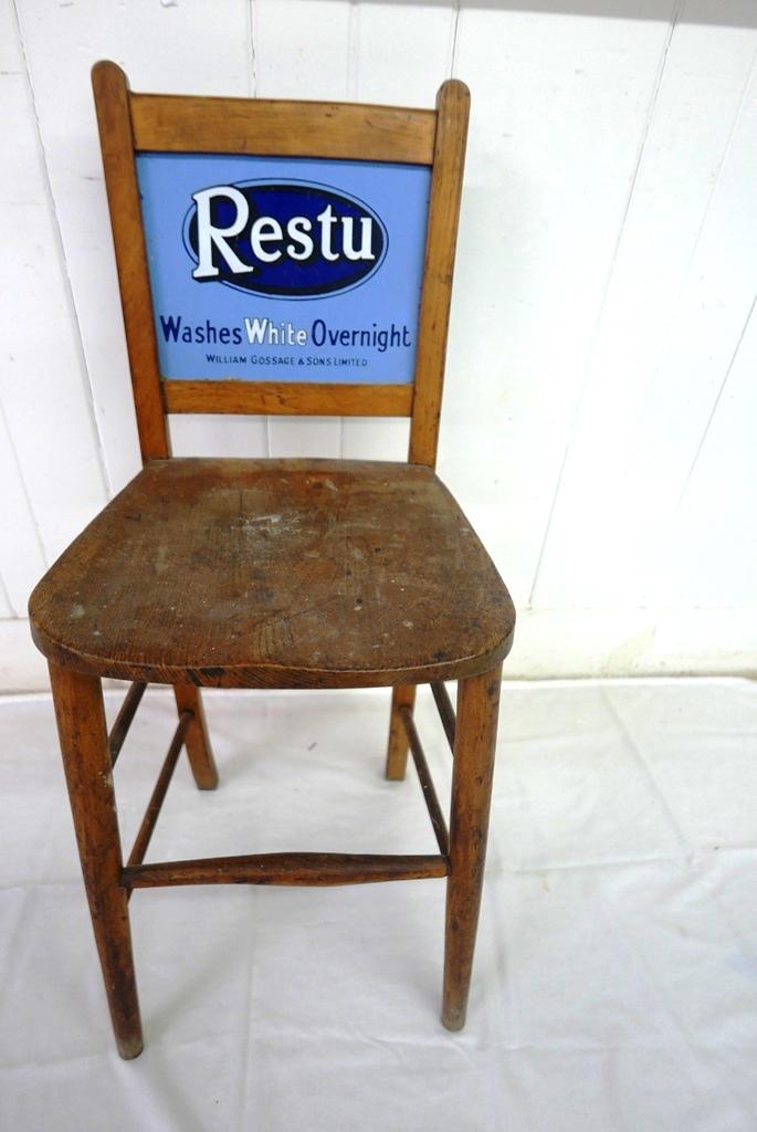 Restu Soap Advertising Grocer's Chair: Antique circa 1920's grocery store advertising chair, double sided enamel sign set into chair back advertising "Restu Washes White Overnight William Gossage & Sons Ltd", 35"H