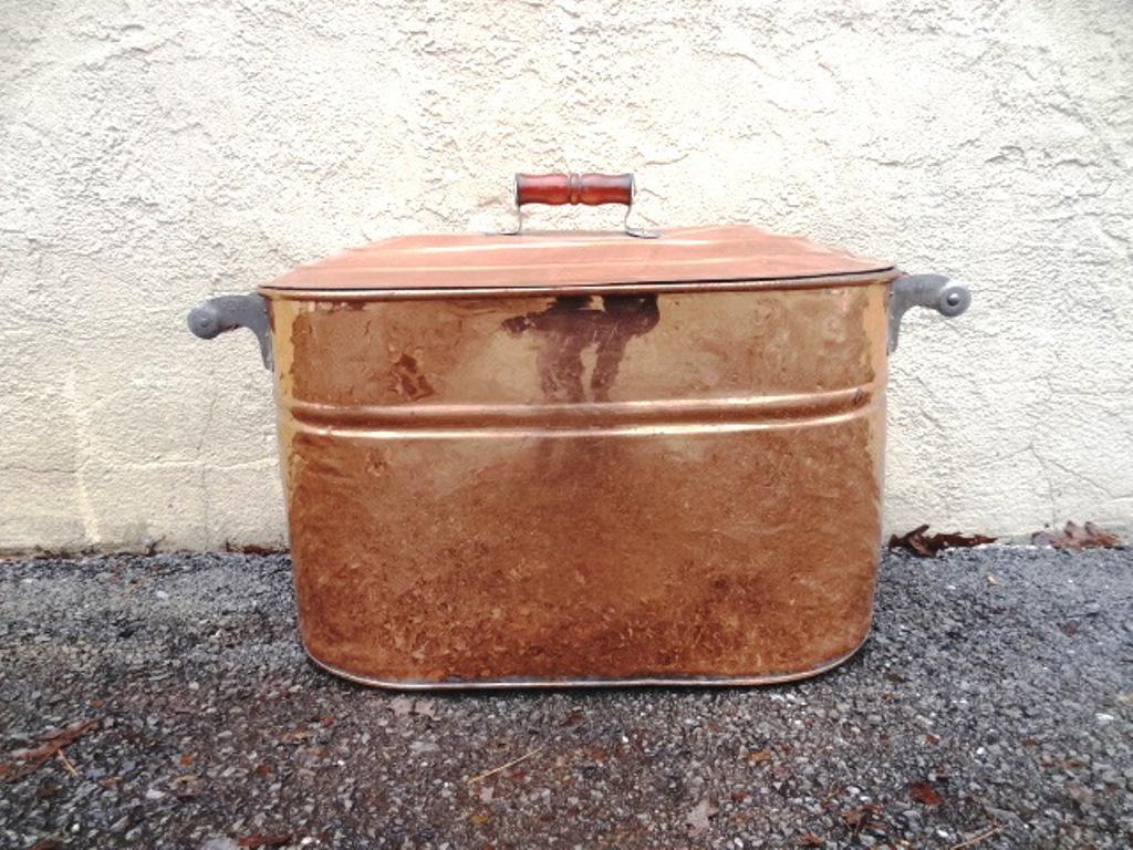 Antique Copper Boiler: Antique copper boiler with lid and wood handles, 28"w between handles