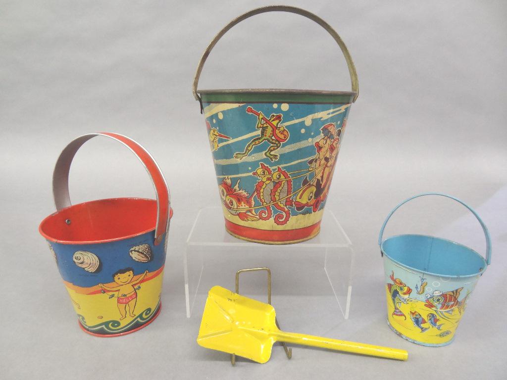 Three Vintage Litho Tin Pails: Small candy pail from King-Up Candies Inc. Hersey Pa. with litho underwater creatures 3"H to rim, pail with litho decoration of children and seashells 4"H, U.S. Metal Toy Mfg. Co. pail with litho deco