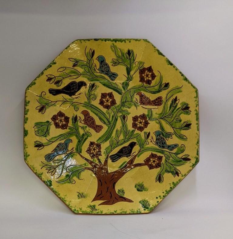 Breininger Bird Tree Charger: Lester Breininger redware octagon platter decorated with colorful parrots in a tree, slip and sgraffito decoration, dated 2005, 14" square